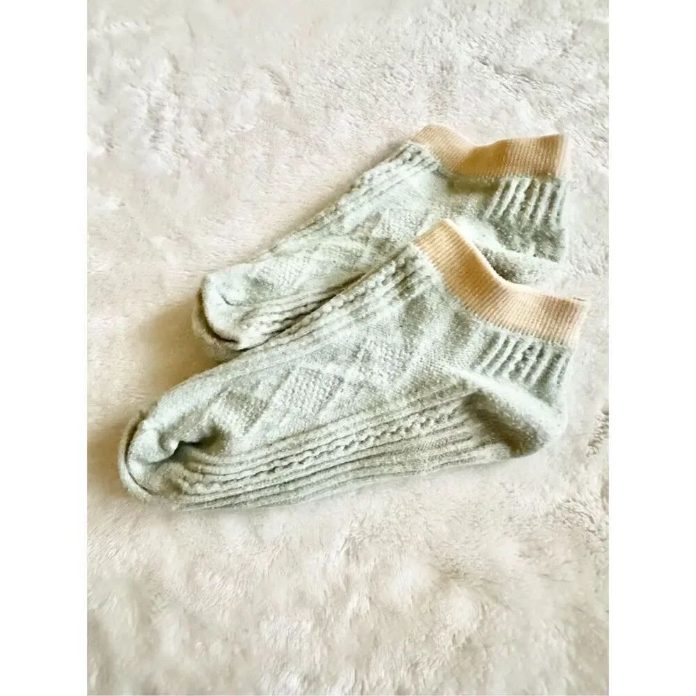 Light green socks with cream trim